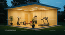 Modern Glass Gym with Fitness Equipment at Dusk