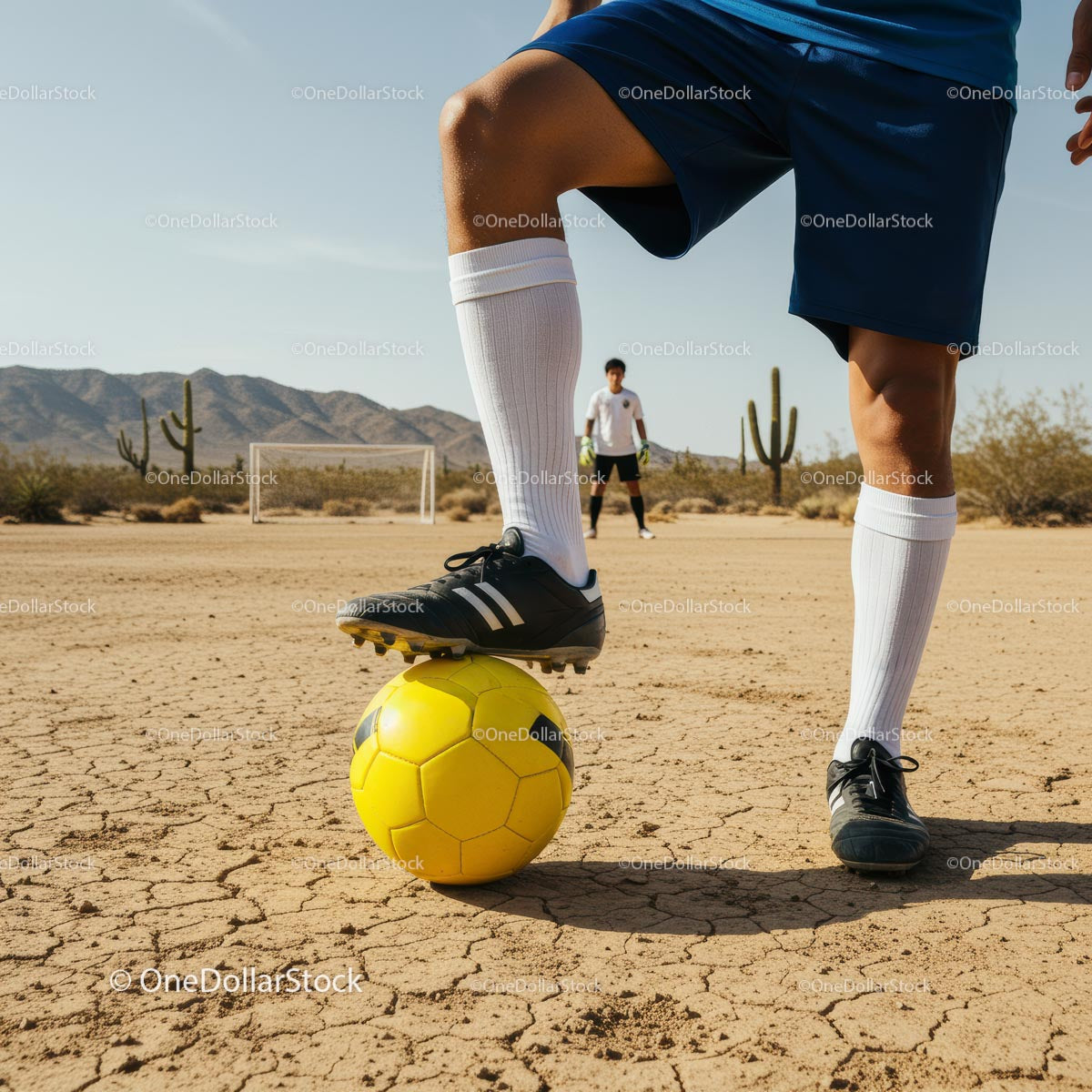 Soccer Practice on Arid Desert Field with Cactus