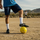 Soccer Training in a Desert Landscape with Yellow Ball