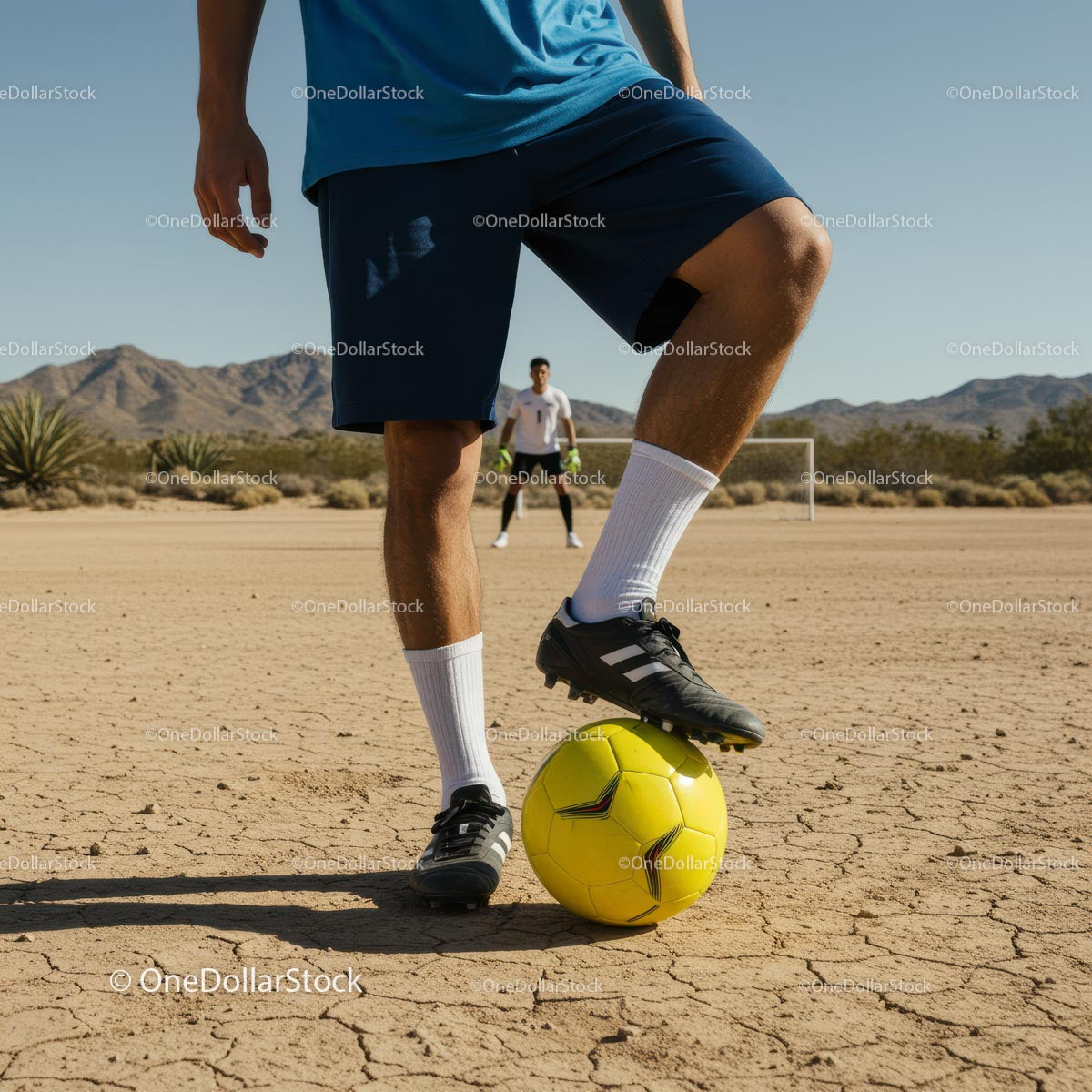 Playing Soccer on a Desert Field with Yellow Ball