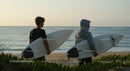 Two Boys with Surfboards at Sunset Beach