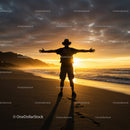 Traveler Silhouette at Sunset on Scenic Beach
