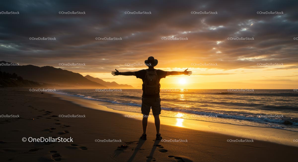Silhouette of Traveler Embracing Ocean Breeze at Sunset