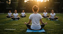 Women Meditating Outdoors in Evening Sunlight