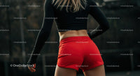 Athletic Woman in Red Shorts Preparing for Outdoor Workout