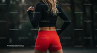 Female Runner in Red Shorts Exercising Outdoors