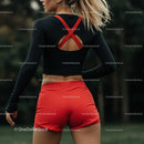 Athletic Woman in Red Shorts Preparing for Outdoor Workout
