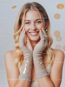 Smiling Woman in Sequin Gloves with Blonde Hair