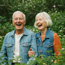Joyful Elderly Couple Smiling in Lush Green Garden