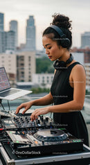 Female DJ Mixing Music on Rooftop with City Skyline View