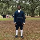 Man in Colonial Costume Among Mossy Oak Trees