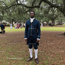 Man in 18th Century Attire at Historical Reenactment