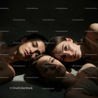 Artistic Portrait of Three Women in Dramatic Light