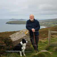 Elderly Man with Border Collie Overlooking a Coastal Landscape