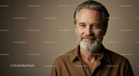 Confident Mature Man in Brown Shirt with Gray Beard