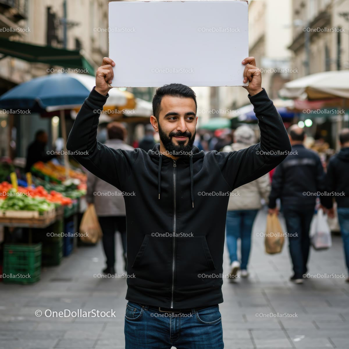 Man Holding Blank Sign in Vibrant City Market