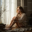Woman in Thoughtful Mood by Sunlit Window