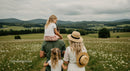 Family Bonding in a Scenic Countryside Meadow