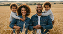 Smiling Family in Sunlit Wheat Field