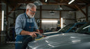 Senior Craftsman Polishing Car in Charming Workshop