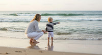 Mother and Child Enjoying a Day at the Beach