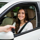Smiling Young Woman Receives Car Keys in White Vehicle