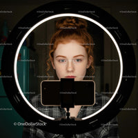 Redhead Woman Taking Self-Portrait with Ring Light
