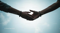 Silhouetted Hands Reaching Out in Unity and Connection