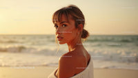 Elegant Woman at Sunset on Tranquil Beach