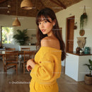 Fashionable Woman in Cozy Yellow Sweater at Home