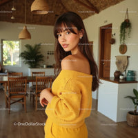 Fashionable Woman in Cozy Yellow Sweater at Home