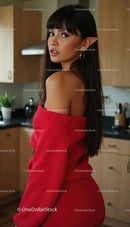 Elegant Woman with Elf Ears in a Red Dress in Modern Kitchen