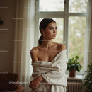 Elegant Woman in Cozy, Light-Filled Interior