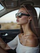 Stylish Woman in Sunglasses Driving a Car