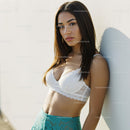 Fashionable Woman in White Top and Teal Skirt