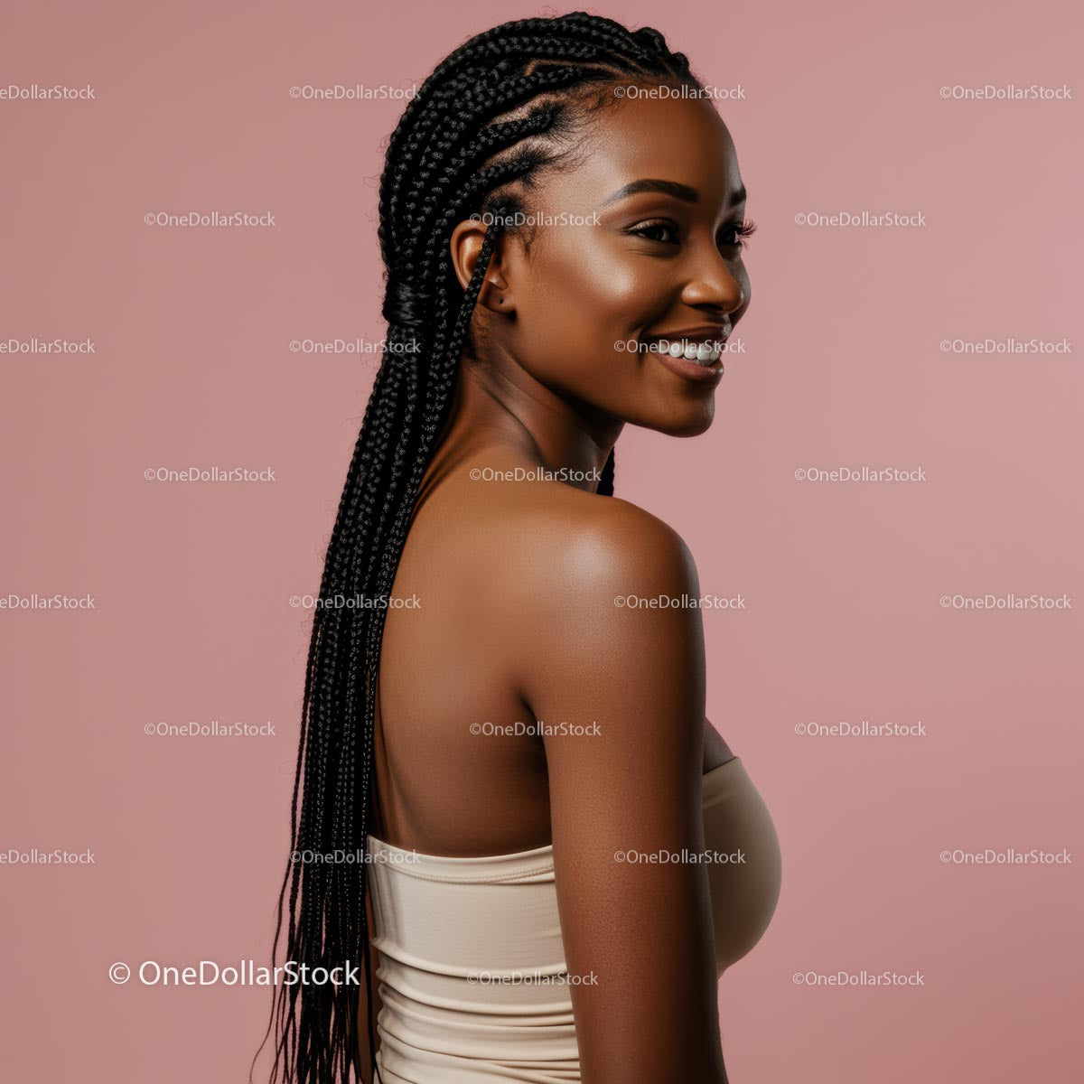 Smiling Woman with Long Hair on Pink Backdrop