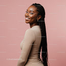 Woman with Long Braids in Beige Dress Smiling