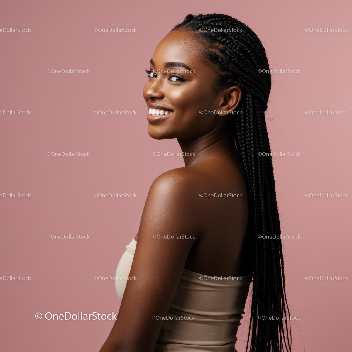 Smiling Woman with Braided Hair Against Pink Background