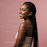 Smiling Woman with Braided Hair Against Pink Background
