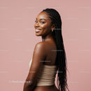 Smiling Woman with Braided Hair on Pink Background