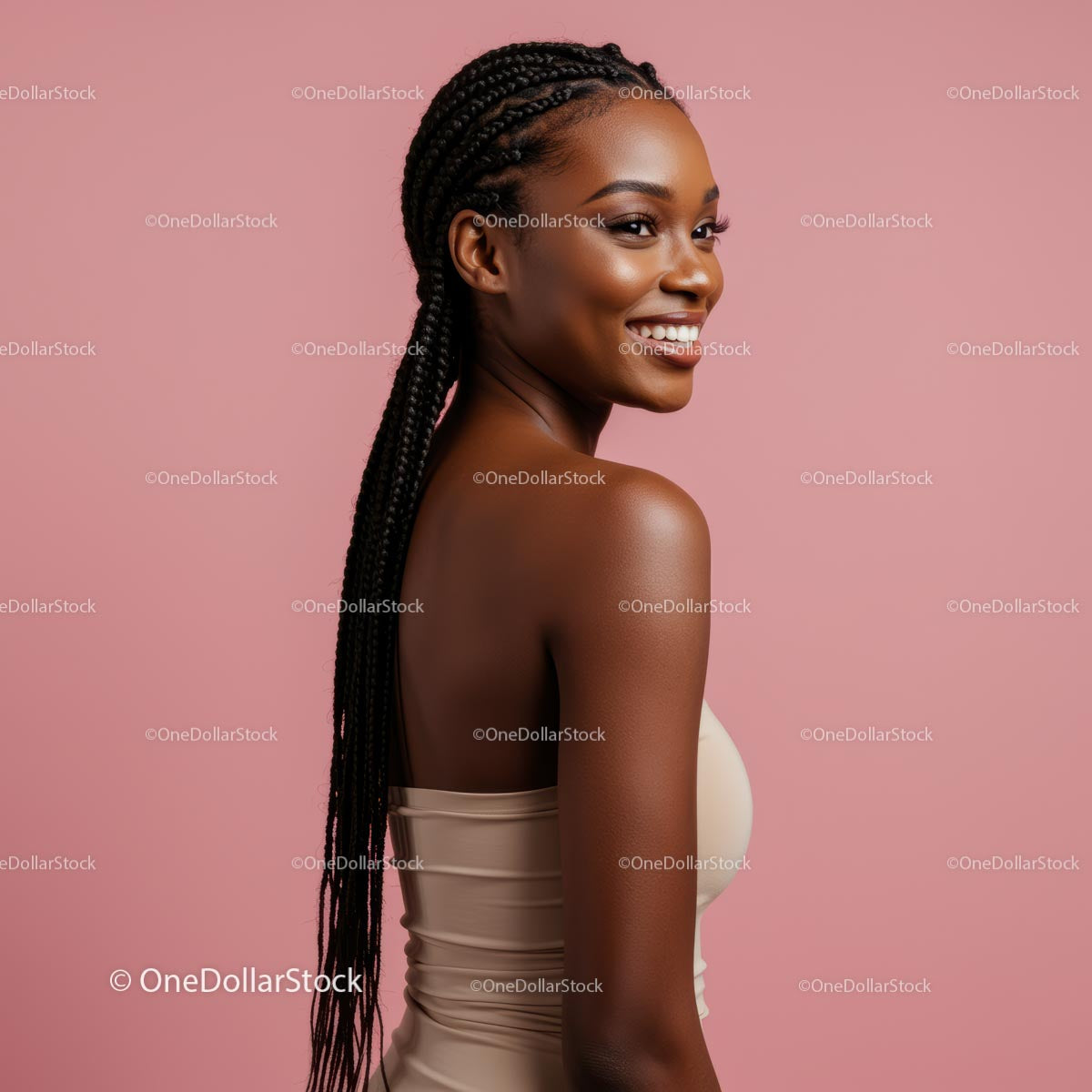 Confident Woman with Braided Hair on Pink Background