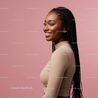 Smiling Woman with Braided Hair Against Pink Background