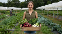Smiling Woman with Freshly Harvested Organic Vegetables
