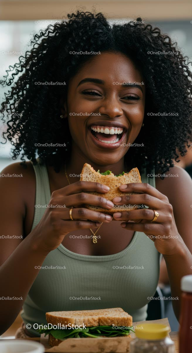 Smiling Woman Enjoying a Healthy Sandwich at Lunch