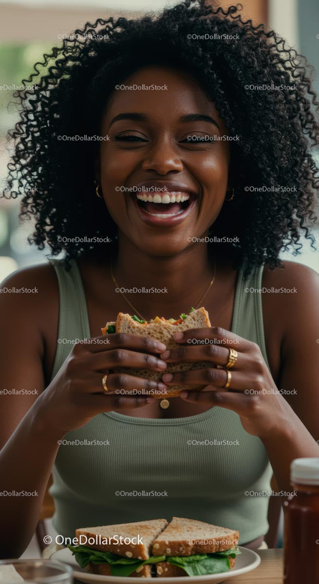 Smiling Woman Enjoying a Healthy Sandwich at Home