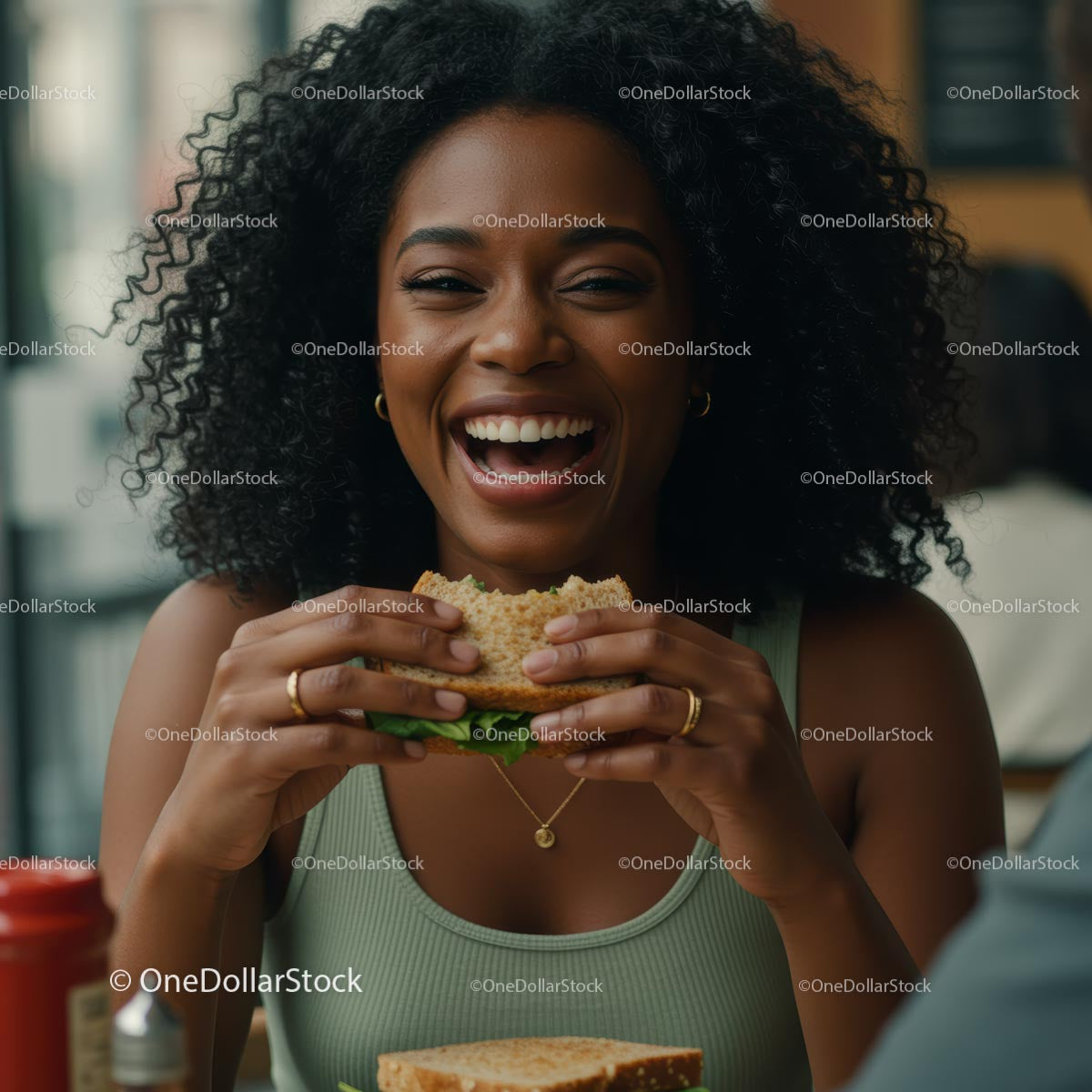 Joyful Woman Savoring a Delicious Burger Indoors
