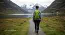 Hiker Exploring Scenic Mountain Valley Trail