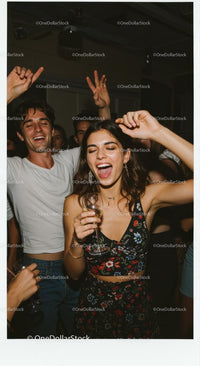 Joyful Friends Dancing at a Lively Night Party