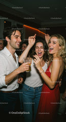 Friends Celebrating at a Party with Laughter and Drinks