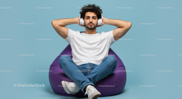 Relaxed Man Listening to Music on Purple Bean Bag